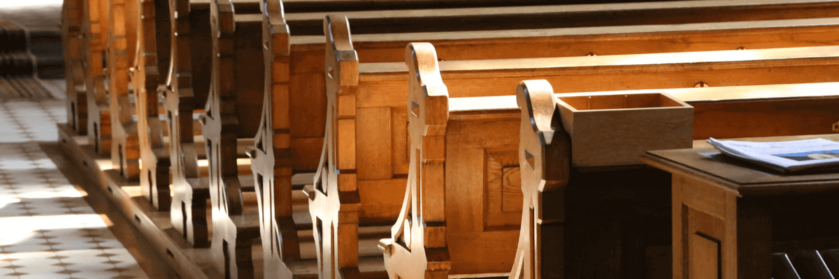 view of church pews or a faith based organization seating